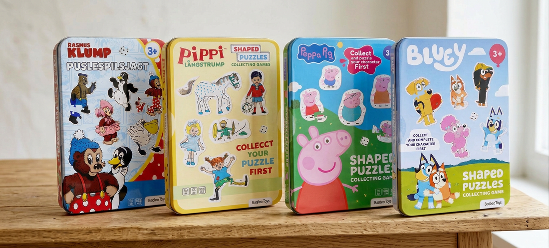 Barbo Toys puzzle games in tin boxes featuring Bluey, Peppa Pig, Pippi Longstocking and Rasmus Klump – collectible shaped puzzles with dice gameplay for children